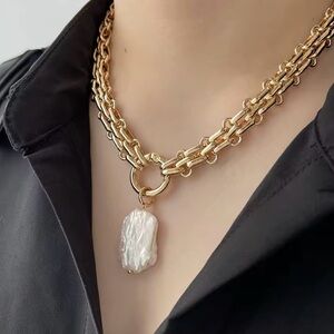 Large square natural freshwater, pearl with gold chunky chain.